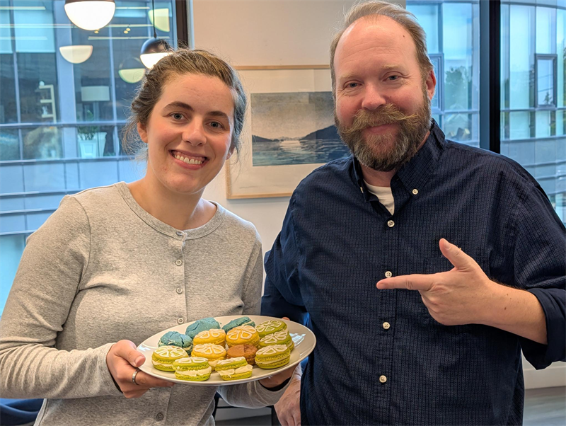 Sarah Morgan and David Broderick celebrating their shared September 9 birthday with macarons baked by David’s daughter.